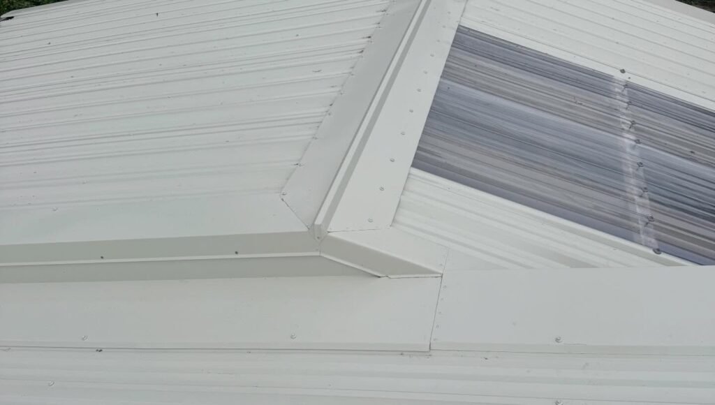 Hip and ridge flashing detail on a new long-run Colorsteel roof, Macandrew Bay, Dunedin