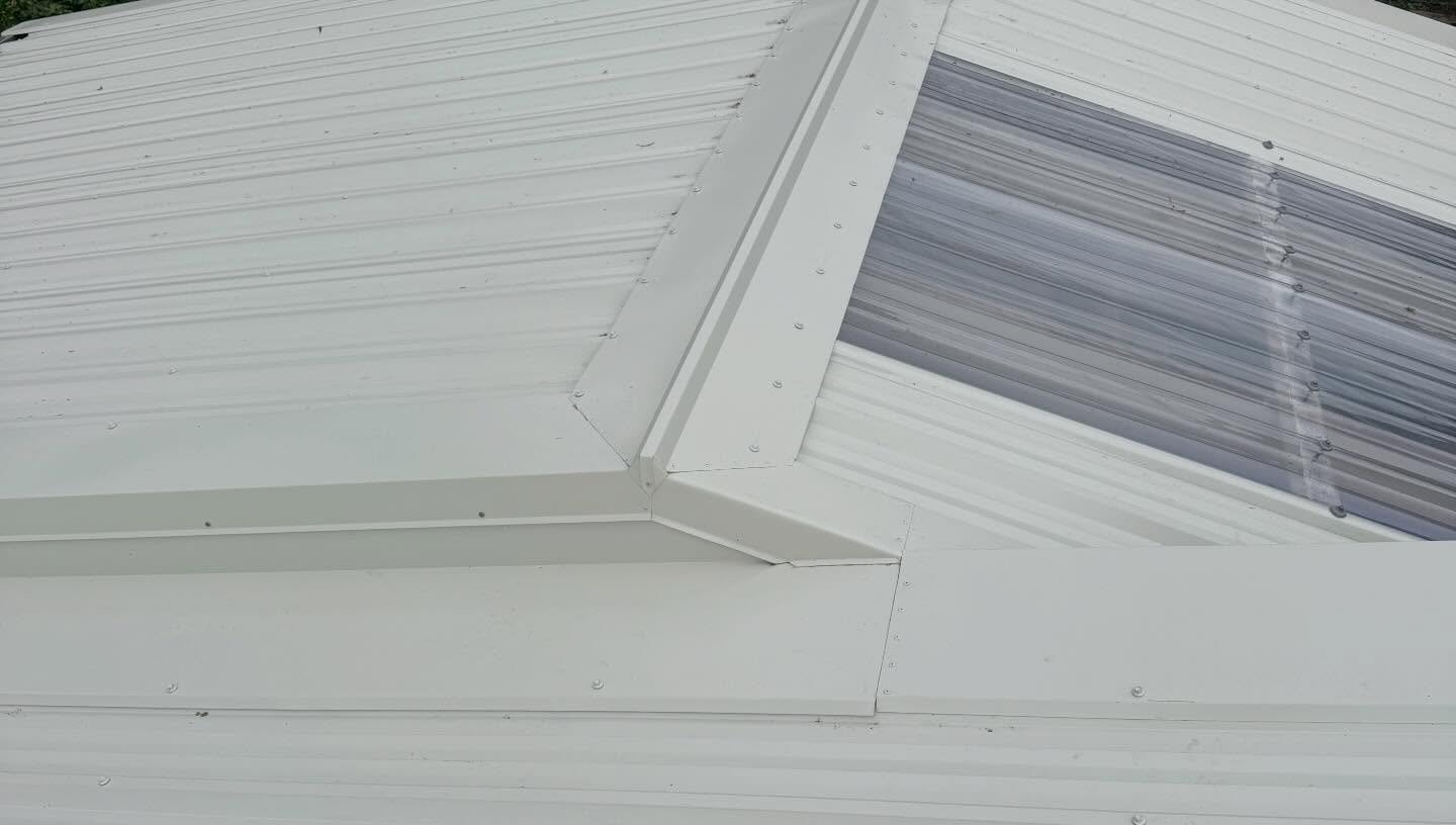 Hip and ridge flashing detail on a new long-run Colorsteel roof, Macandrew Bay, Dunedin